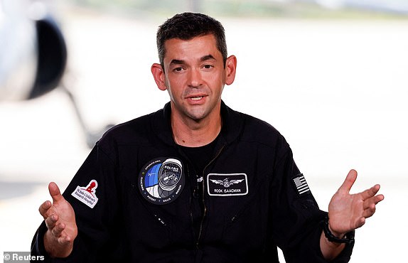 Commander Jared Isaacman of Polaris Dawn, a private human spaceflight mission, speaks at a press conference at the Kennedy Space Center in Cape Canaveral, Florida, U.S. August 19, 2024. Launch aboard a SpaceX Falcon 9 rocket is scheduled for August 26. REUTERS/Joe Skipper