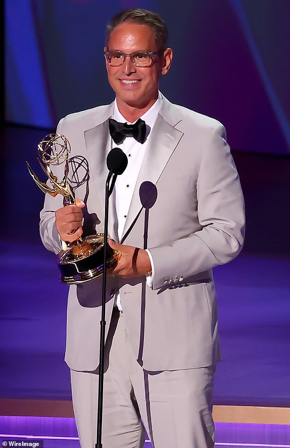 LOS ANGELES, CALIFORNIA - SEPTEMBER 15: Honoree Greg Berlanti accepts the Governors Award onstage during the 76th Primetime Emmy Awards at Peacock Theater on September 15, 2024 in Los Angeles, California.  (Photo by Leon Bennett/WireImage)