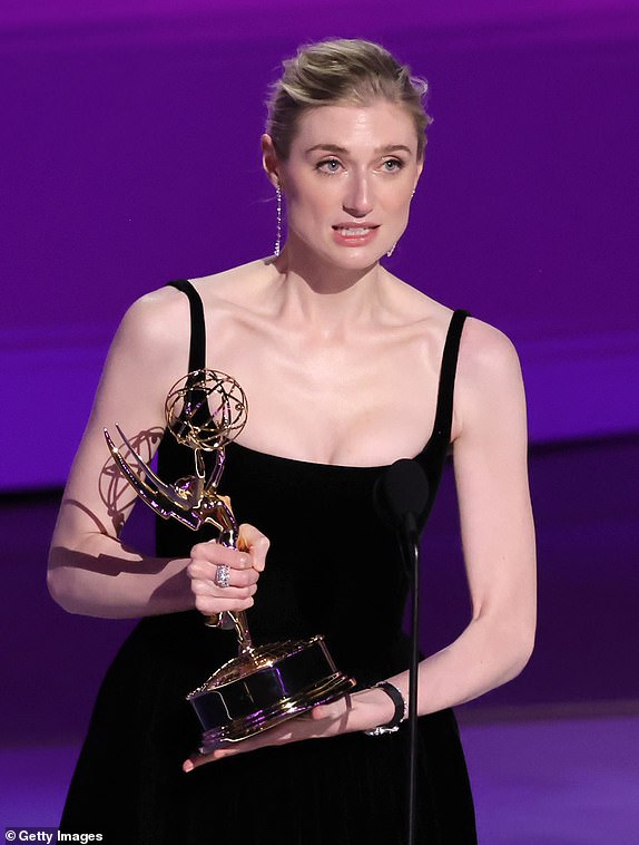 LOS ANGELES, CALIFORNIA - SEPTEMBER 15: Elizabeth Debicki accepts the Outstanding Supporting Actress in a Drama Series award for "The Crown" onstage during the 76th Primetime Emmy Awards at Peacock Theater on September 15, 2024 in Los Angeles, California.  (Photo by Kevin Winter/Getty Images)