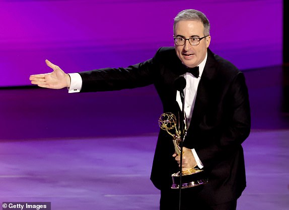 LOS ANGELES, CALIFORNIA - SEPTEMBER 15: John Oliver accepts the Outstanding Scripted Variety Series award for "Last Week Tonight with John Oliver" onstage during the 76th Primetime Emmy Awards at Peacock Theater on September 15, 2024 in Los Angeles, California.  (Photo by Kevin Winter/Getty Images)